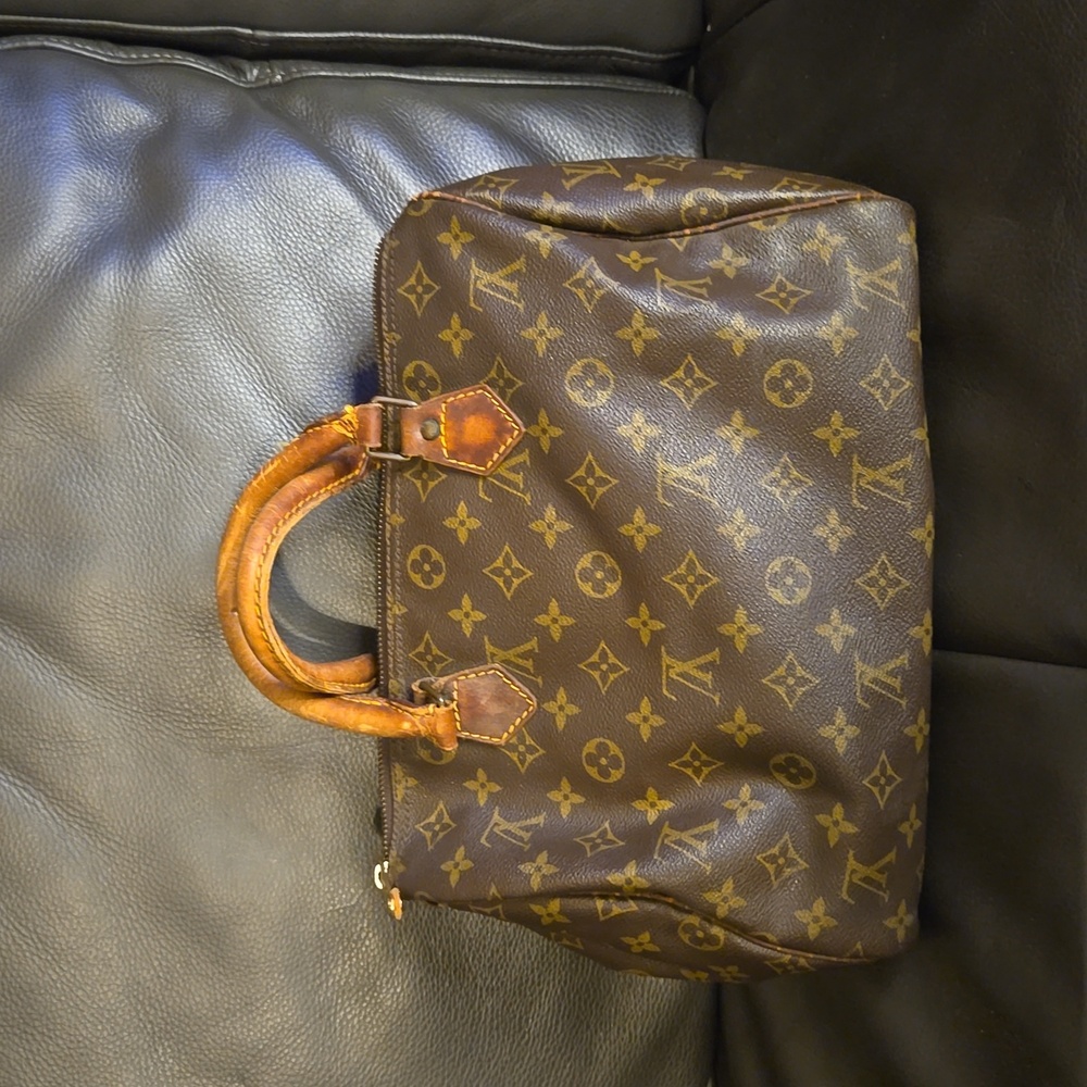Louis Vuitton Brown Monogram Canvas Handbag with Tan Leather Handles